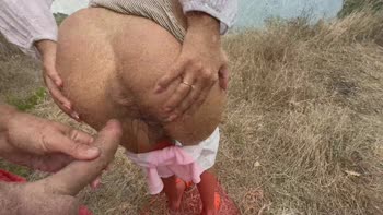 ArrestMe's Oceanic Orgy: Outdoor Handjob to Cum on Natural Tits