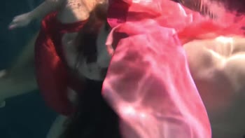 Russian Lesbians Submerged in Sultry Underwater Show