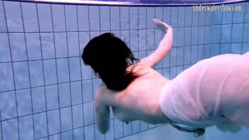 Andrea's Underwater Delight: A Teenage Brunette's Splashy Solo