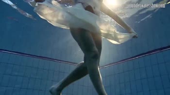 Andrea's Underwater Delight: A Teenage Brunette's Splashy Solo