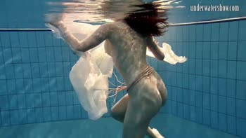 Andrea's Underwater Delight: A Teenage Brunette's Splashy Solo