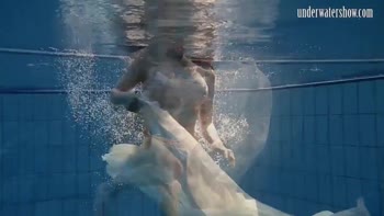 Andrea's Underwater Delight: A Teenage Brunette's Splashy Solo