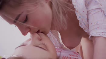 ULTRAFILMS LEGENDARY Leah Maus got a horny crush on Eva Elfie, seducing her for a fuck on a wide bed