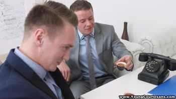 European Courtesan Tempts Two Businessmen in Sensual 3some
