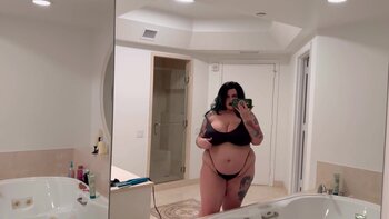Gothic Goddess Marilyn Mayson Teases with Her Stunning BBW Curves