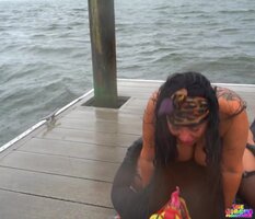 Clowning Around Outdoors with Tattooed Brunette Babe