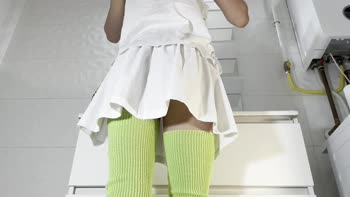 Bathroom Babe in Mini Skirt: Upskirt Delights Without Undies