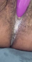 Ediblelips30 Squirting Orgasm with Strapless Dildo on Her Black Hairy Pussy