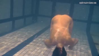 Petite Russian Mermaid Seduces Underwater