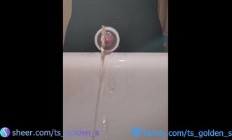 TSgoldenS's Steamy Golden Shower & Cumshot Show