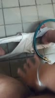 Bellybuttonfan87's Sizzling Solo: Water Hose Balcony Masturbation