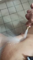 Bellybuttonfan87's Sizzling Solo: Water Hose Balcony Masturbation