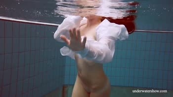 Lola's Aqua Seduction: A Hot Brunette in Underwater Solo
