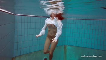 Lola's Aqua Seduction: A Hot Brunette in Underwater Solo