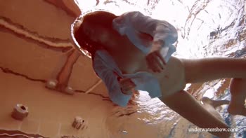 Lola's Aqua Seduction: A Hot Brunette in Underwater Solo