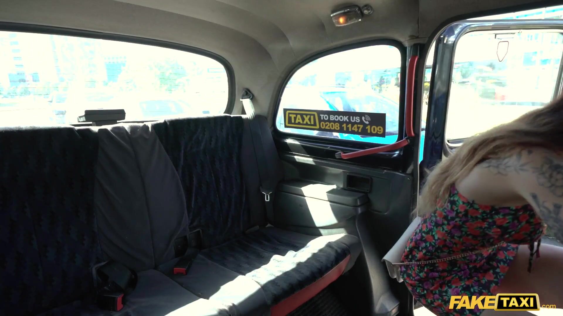 Fake Taxi Tattooed Babe Seduces the Taxi Driver by Showing off her Tattooed Body