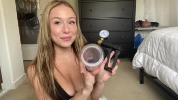 Playful Petite Blonde Teases with Pussy Pump Try-On