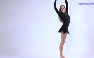 Berta's Sultry Stretch: Blonde Ballerina Reveals Big Boobs
