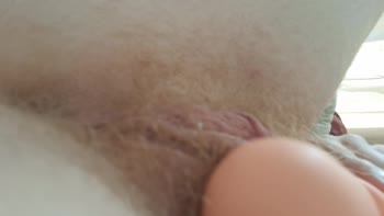 Ava Anson's Hairy Redhead Climaxes Multiple Times with Vibrator