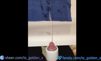 TSgoldenS' Pissing Delight: Cumming Hard After a Golden Shower
