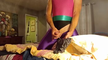 LycraLove7's Spandex Sensation: Shiny Swimsuit Cumshot Delight