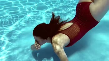 Fernanda's Pink Perfection: Underwater Gymnastics Delight