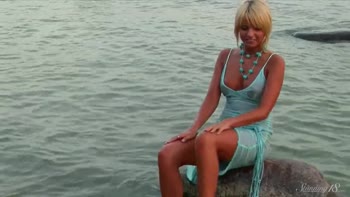 Sultry Blonde Stuns at Beach in Necklace and Nothing More