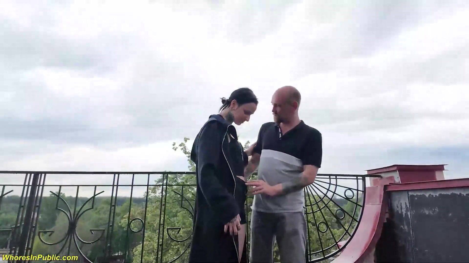Small Ass Stretched on a Public Rooftop