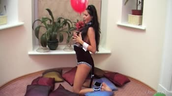 Kitty's Seductive Balloon Tease: A Gorgeous Brunette's Hot Show