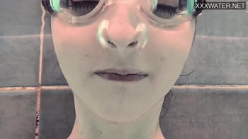Petite French Babe Emie Amfibia's Underwater Nude Delight