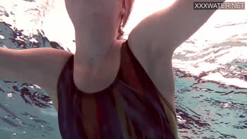 Petite French Babe Emie Amfibia's Underwater Nude Delight