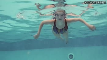 Petite French Babe Emie Amfibia's Underwater Nude Delight