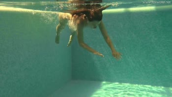 Stephanie Moon's Underwater Seduction: A Petite Russian Babe's Outdoor Delight