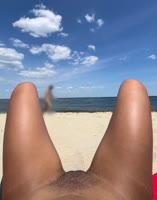 Up Her Skirt's Beach Bliss: Flashing Ebony Pussy at Nude Beach