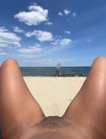 Up Her Skirt's Beach Bliss: Flashing Ebony Pussy at Nude Beach