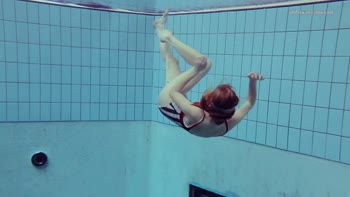 Nastya's Underwater Seduction: A Soaking Solo Experience