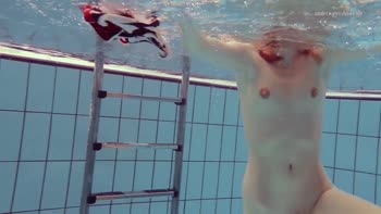Nastya's Underwater Seduction: A Soaking Solo Experience