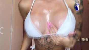 Roxxxysh's Sizzling Oil Show: Tattooed Brunette Teases with Big Tits and Dildo