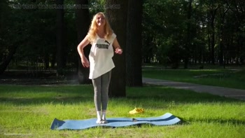 Sultry Russian Teen (18+) Smokes in Serene Outdoor Setting