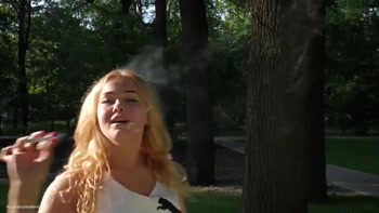 Sexy Russian Girl Smoking Cigarette Relaxed Outdoors