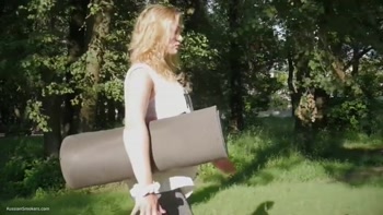 Sultry Russian Teen (18+) Smokes in Serene Outdoor Setting