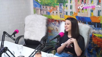 Flavia Oliver performs oral sex on Natasha Steffens during the recording of the California Podcast