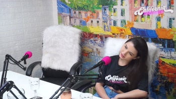 Flavia Oliver performs oral sex on Natasha Steffens during the recording of the California Podcast