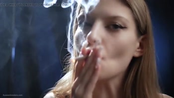 Blonde Bombshell Sizzles in Smoking Solo Session