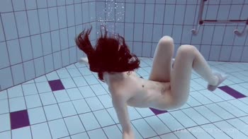 Russian Teen (18+) Roxalana Cheh Dives into Nude Underwater Delight