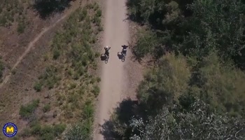 Two hot big breasted MILFs having a threesome with a toyboy in the open air