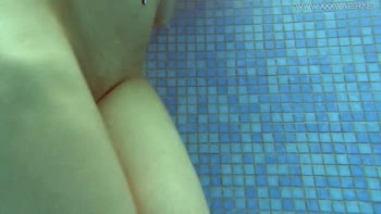 Lina Mercury's Sizzling Underwater Seduction in Red Lingerie