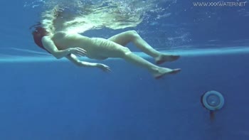 Lina Mercury's Sizzling Underwater Seduction in Red Lingerie