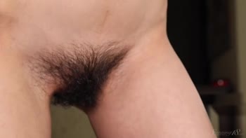 Meet Rezza: A Stunning Brunette's Seductive Undressing