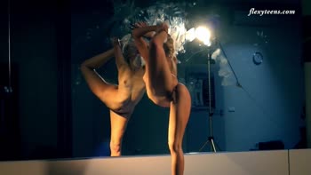 Elena's Supple Flexibility: Blonde Gymnast Bends Naked